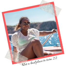 Picture of author on a boat. Text reads: Not a bad place to turn 22.