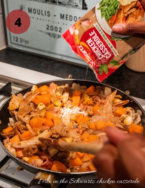 Me adding the Schwartz chicken casserole to the pie filling