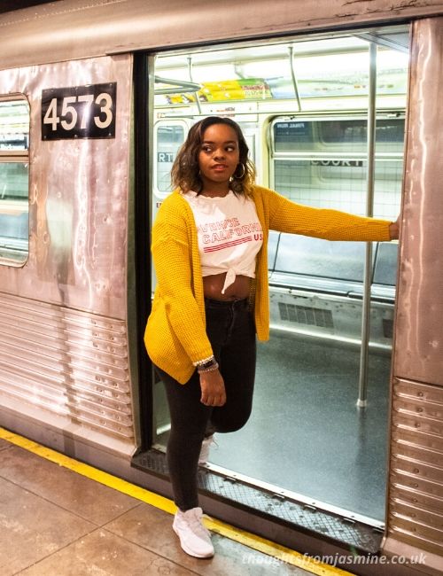 Is New York worth it? Me posing in a subway cart.