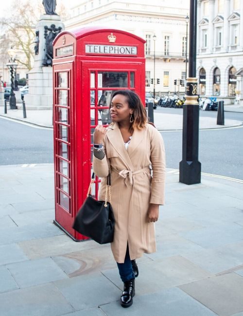 Photo of me in beige trench coat and black leather bag